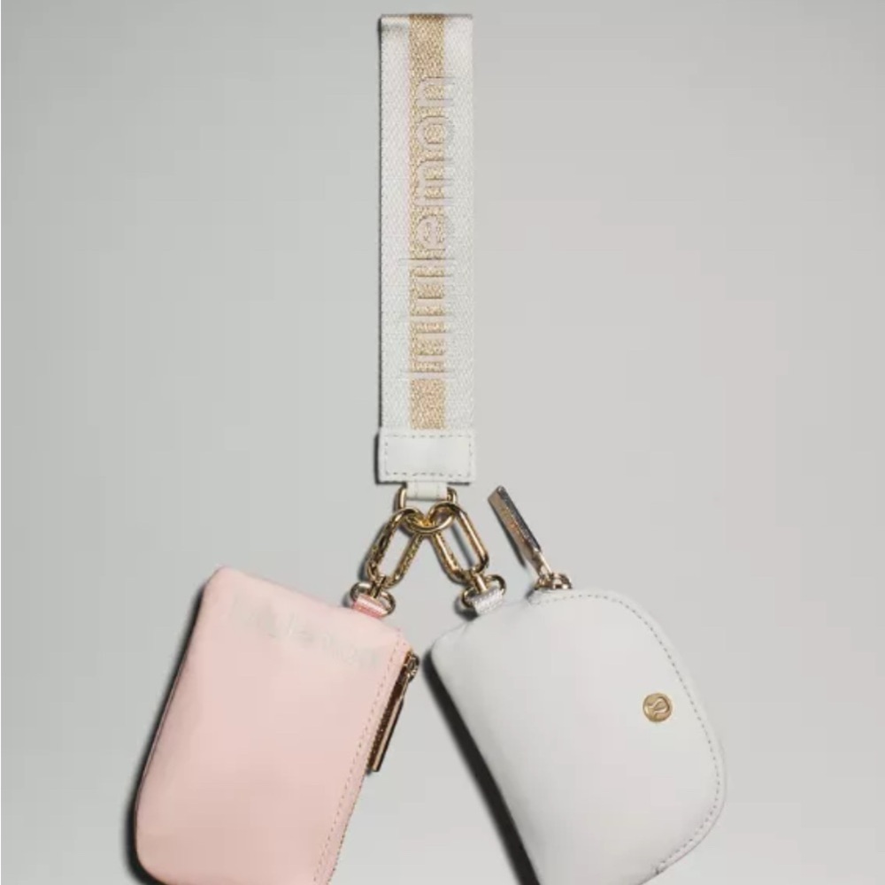 lululemon athletica Pink and White dual pouch Wristlet Set